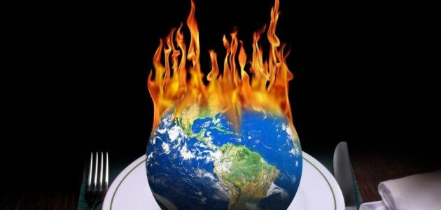burning world on dinner table picture id626825964