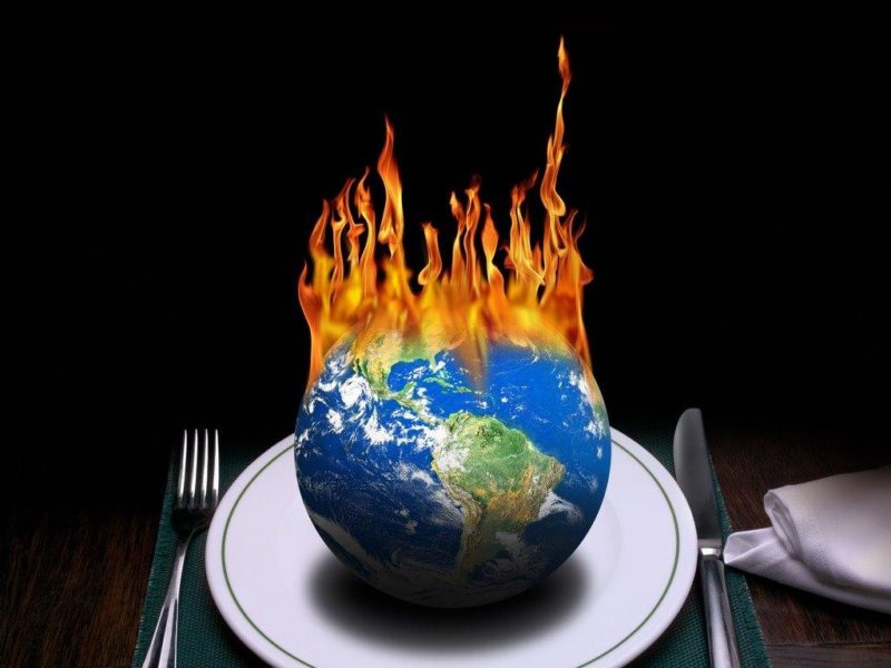 burning world on dinner table picture id626825964