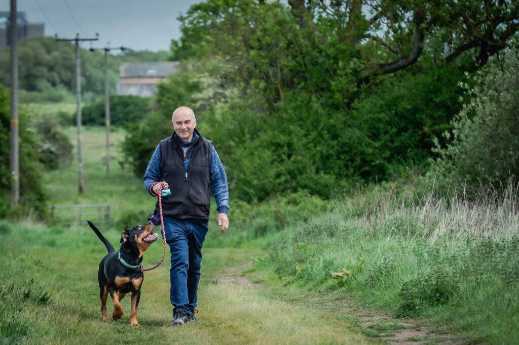 Philip Lymbery and rescue dog Bruce credit Richard DunwoodyCIWF